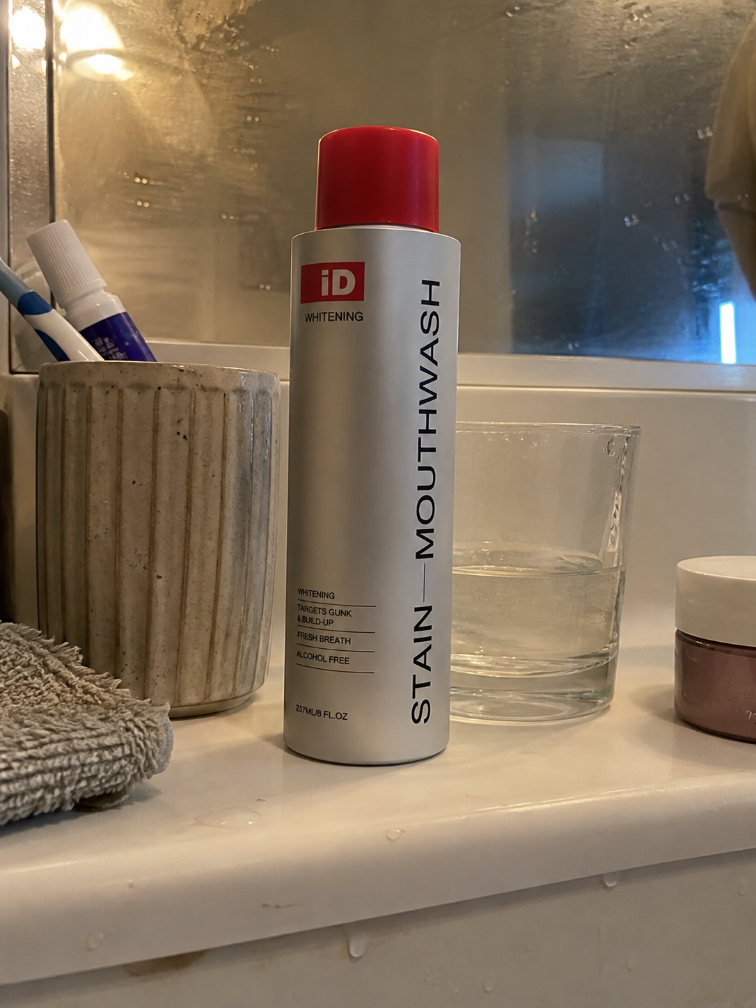 UGC-style bathroom vanity photo of original iD mouthwash