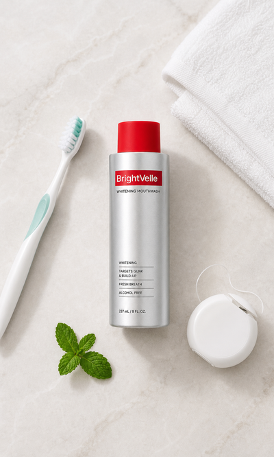 BrightVelle mouthwash with toothbrush, floss, towel, and mint
